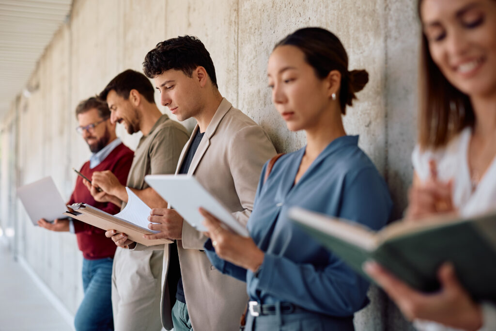 New graduates lining up for job interviews